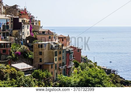 Corniglia, Italy - July 8, 2017: View Of Corniglia Houses On A Sunny Day