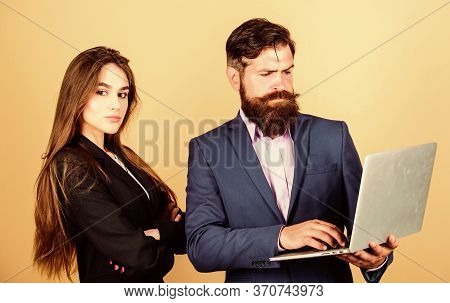 Discussing Progress. Man Bearded Manager Show Financial Report Laptop. Woman And Guy Colleague Worki