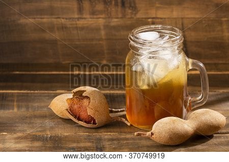 Tamarindus Indica - Tamarind Tropical Fruit. White Background