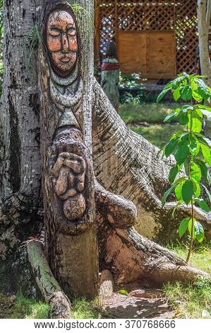 Santo Domingo, Dominican Republic-march 13, 2020: Sculptures In Tree Trunks At Los Tres Ojos (the Th