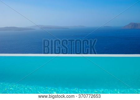 Infinity Pool Santorini Greece Looking Out Over The Caldera Of The Greek Island, Luxury Vacation, Sw