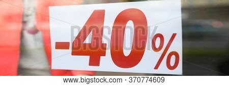 Close-up Of Sign With 40 Percent Announcement, Shopping On Reduced Prices. Label Of Shop, Announceme