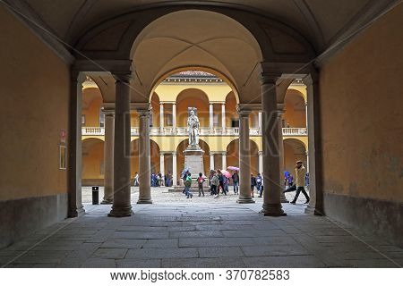 Pavia, Italy - May 15, 2018: This Is An Arched Passage Into The Cortile Voltiano Courtyard Of The Un