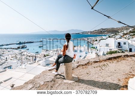 Mykonos Greece, Woman On Vacation At The Greek Island Mykonos, Girl In Dress At The White Streets Of