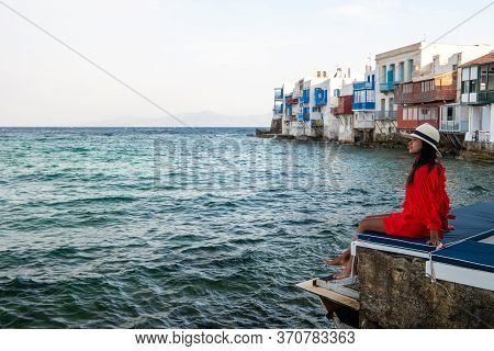 Mykonos Greece, Woman On Vacation At The Greek Island Mykonos, Girl In Dress At The White Streets Of