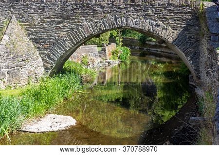 Old Bridge Over River Elz In Monreal, Germany