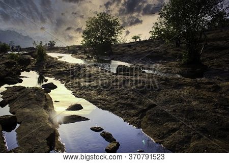 A Landscape Of A Sunset In A Place Named Athirapally Located In Kerala State, India