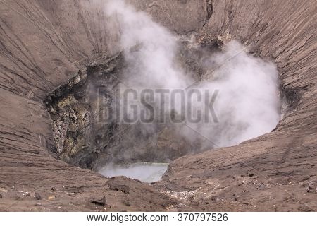 Mount Bromo Smoke Coming Out Of Main Crater, Before Sunrise, Java Indonesia. Bromo Tengger Semeru Na