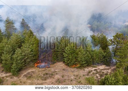 Aerial Drone View Of A Wildfire In Forested Area.