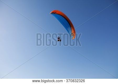 Glider Pilot Flying On Glider. Skydiving Flying. Parachute Extreme Sport