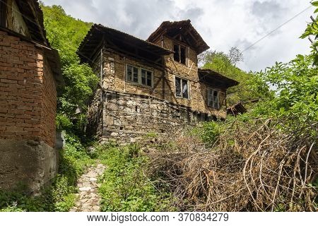 Pirin, Bulgaria -  May 2, 2014: Old House Know As The House Of Pirin Dragon In Village Of Pirin, Bla