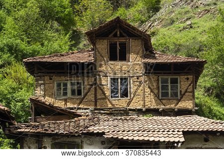 Pirin, Bulgaria -  May 2, 2014: Old House Know As The House Of Pirin Dragon In Village Of Pirin, Bla