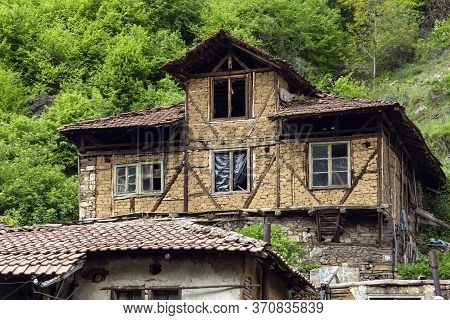 Pirin, Bulgaria -  May 2, 2014: Old House Know As The House Of Pirin Dragon In Village Of Pirin, Bla