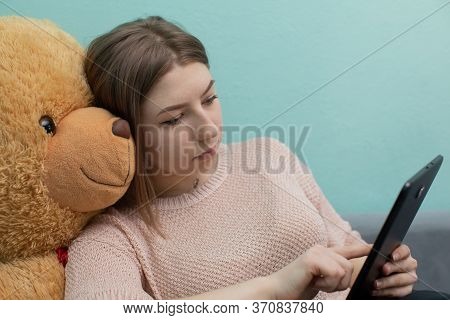 A Teenager With Her Beloved Plush Companion Tries To Study For The Matriculation Examination.