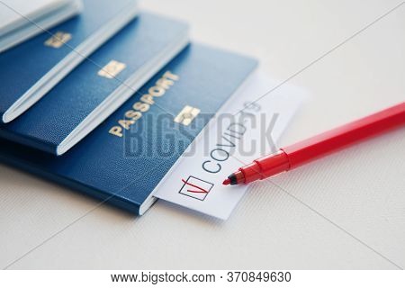 Immunity Passport, Risk-free Certificate Concept. Note Covid-19 Coronavirus, Passport, Red Pen And C