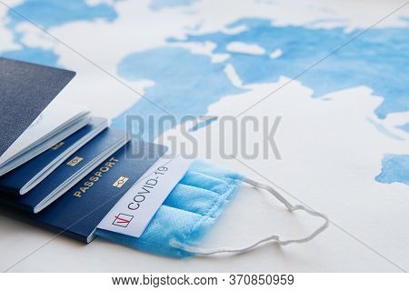 Immunity Passport, Risk-free Certificate Concept. Passports With Note Covid-19 With Red Check Mark, 