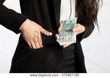 Close-up Shot Of Banknotes And A Womans Hand.