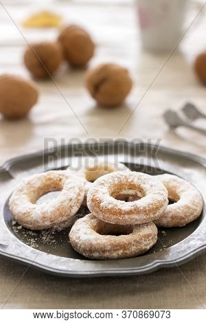 Sand Dough Biscuits, Coffee And Walnuts On A Linen Tablecloth. Rustic Style.