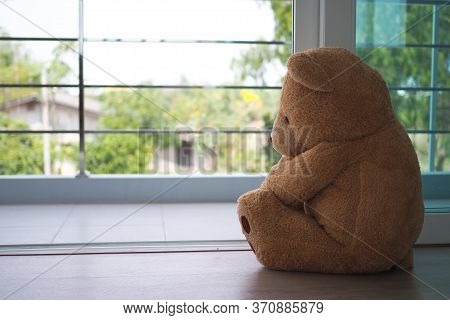 Major Depressive Disorder Mdd Concept. Grief Of Children. Teddy Bear Sitting Looking At The House Wi