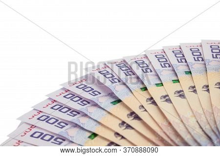 Money Stack Arranged In A Circle On A White Background And Space