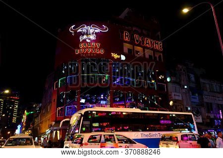 Ho Chi Minh City, Vietnam - March 27,2019: Neon Lights Of Restaurants And Bars On Bui Vien Walking S