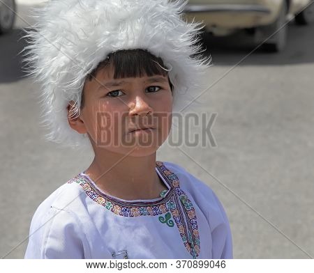 Ashgabat, Turkmenistan - September, 12, 2017.  Portrait Of  Unidentified Serious  Asian Boy.  Boy In