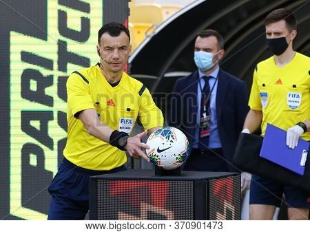 Kyiv, Ukraine - June 6, 2020: Referee Serhiy Boyko Goes To The Pitch Before The Ukrainian Premier Le