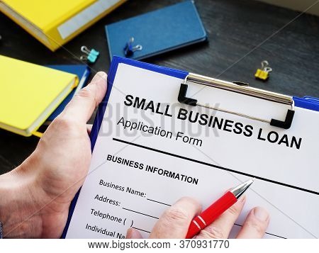 Empty Form For Small Business Loan And Pen.