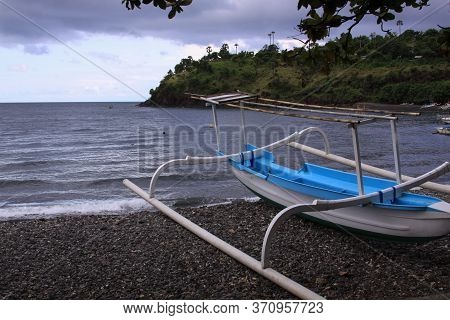 Jukung Boat On Cloudy Day In Bali, Indonesia. Amed Has Become A Popular Tourist Destination And Is L