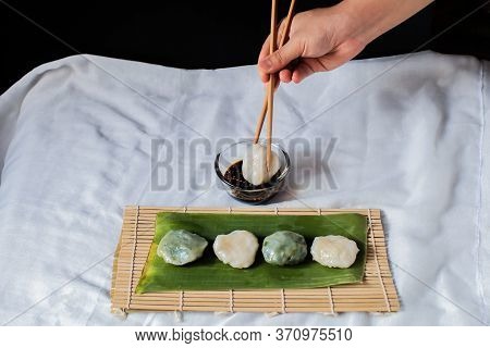 Hand Use Chopstick Pinch Chinese Chive Dumpling, (kanom Gui Chai)mixture Of Flour With Chives Garlic
