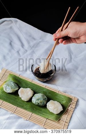 Hand Use Chopstick Pinch Chinese Chive Dumpling, (kanom Gui Chai)mixture Of Flour With Chives Garlic