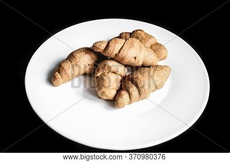 Croissants On A White Plate. Fresh Bakery