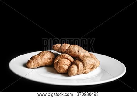 Croissants On A White Plate. Fresh Bakery