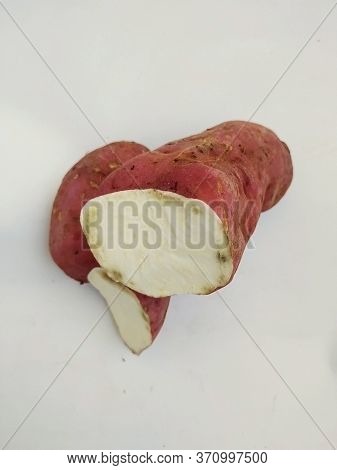 Broken Pink Color Sweet Potato Isolated In A White Background. This Is The Main Food In Pongal Or Ma