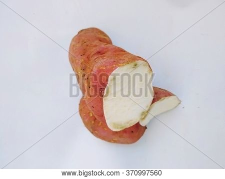 Broken Pink Color Sweet Potato Isolated In A White Background. This Is The Main Food In Pongal Or Ma