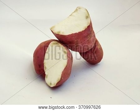 Broken Pink Color Sweet Potato Isolated In A White Background. This Is The Main Food In Pongal Or Ma