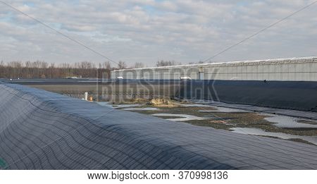 Irrigation Basin For A Greenhouse For Growing Tomatoes And Peppers