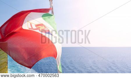 The Italy Flag Flutters In The Wind. The Symbol Of Italy On Board A Ship At Sea. High Quality Fullhd