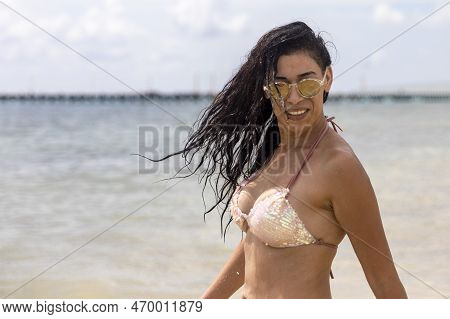 Spectacular Woman With Sexy Smile Under The Tropical Sun Enjoying The Caribbean Sea On The White San