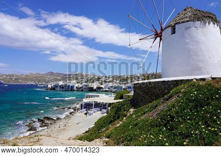 Beautiful View Of Mykonos Village With Traditional Windmill And Sescape, Mykonos Island, Greece