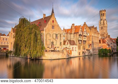 Flemish And Ornate Architecture Of Idyllic Bruges With Canal, Flanders, Belgium