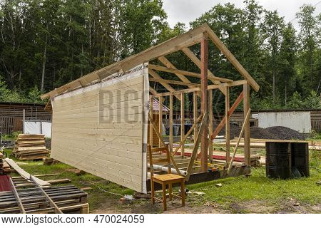 Construction Of A Frame House. Timber Frame House, New Build Roof