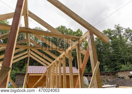 Construction Of A Frame House. Timber Frame House, New Build Roof
