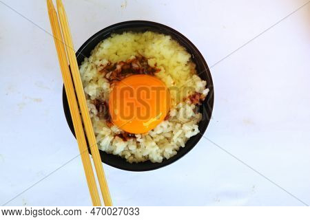 Tamago Kake Gohan Or Raw Egg On Rice. Traditional Food From Japan, Eat On Breakfast