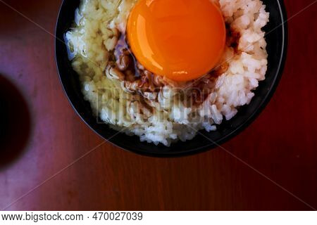 Tamago Kake Gohan Or Raw Egg On Rice. Traditional Food From Japan, Eat On Breakfast