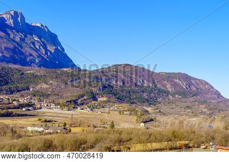 View Of Vineyards And Landscape In The Alps Mountains, On A Clear Winter Day, Trentino, Northern Ita