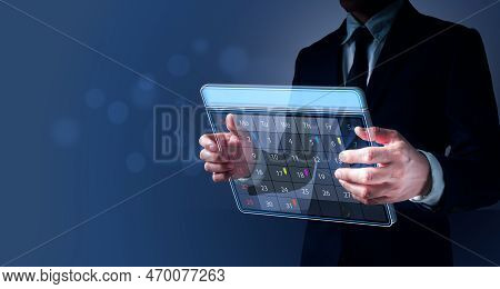 A Man His Hand Is Holding A Visual Appointment Reminder For The Calendar As Well As The Organizer's 