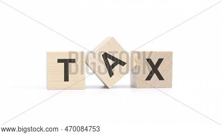 Tax - Wooden Blocks With Letters, Top View On White Background