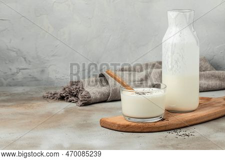 A Bottle Of Milk And Glass Of Yogurt, Kefir, Fermented Milk, Probiotic Cold Fermented Dairy Drink. T