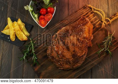Veal Cutlet From Avila, Spain With Potatoes And Vegetables Juicy And Tender